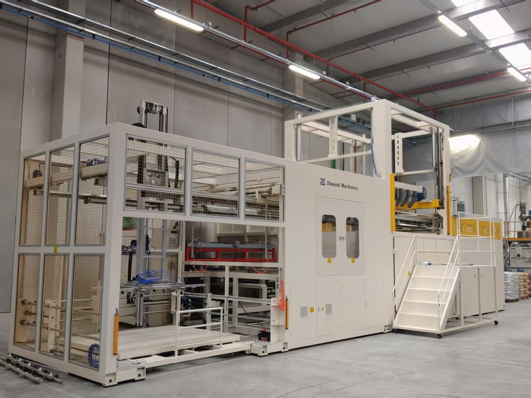 赋能豫北智造 展仕厚板吸塑机助力新乡汽车与轨道交通产业升级